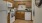 kitchen area with wood cabinets and white appliances