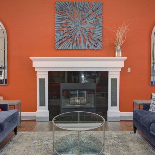 Clubroom spacious clubroom with ample seating, modern decor & a fireplace